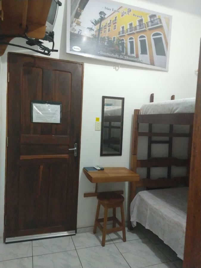 Quarto Triplo Econômico com Banheiro Compartilhado Externo